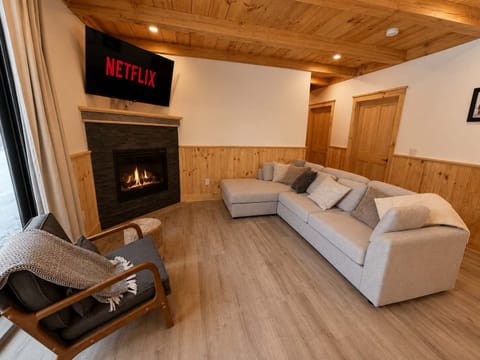 Living Room: Relax in a bright and inviting living room with comfortable seating, tasteful décor, and plenty of space to unwind after a full day of exploring the area.