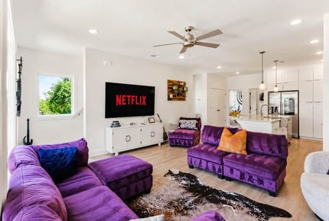 Living Room: Relax in an elegant living room featuring plush seating, refined décor, warm lighting, and a welcoming atmosphere perfect for unwinding, gathering, or enjoying a quiet evening.