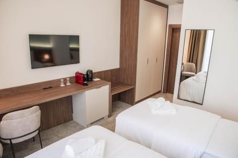 Standard Twin Room, Balcony, City View | In-room safe, desk, laptop workspace, soundproofing