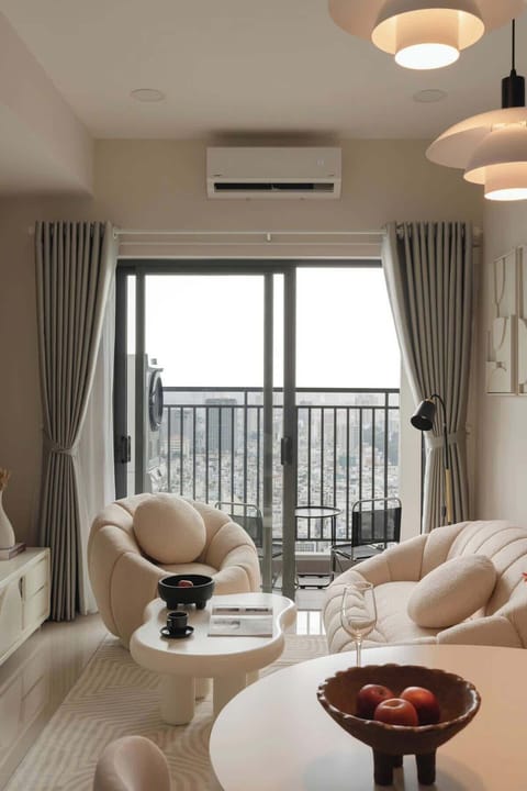 Step out to the private balcony for open-sky views of the city. Equipped with seating for two, a washer and dryer, and a great spot to enjoy your smoke.