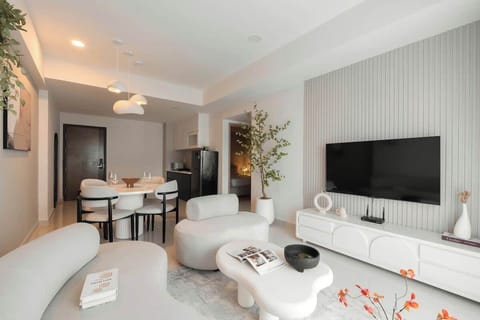 Spacious & Minimalistic Design, equipped with a comfortable sofa that fits 3, with a single seater sofa, ideal for families and friends to gather around and watch on a 55inch 4k smart tv. 