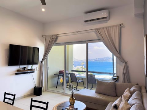 Catch your favorite shows while enjoying the blue sea horizon.