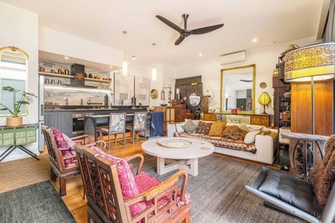 The main living area invites slow, inspiring moments with warm textures, handcrafted décor, and gentle natural light that enhance every stay.