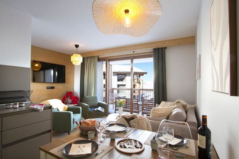 Morning light spills across the dining table just steps from your private terrace.