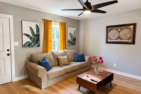 Unit A - bright living room with smart TV