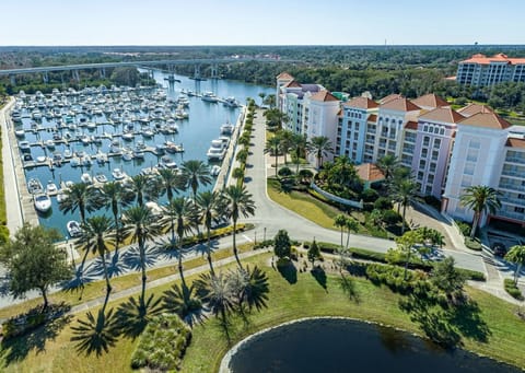 Aerial view of the yacht harbor marina packed with boats alongside the resort