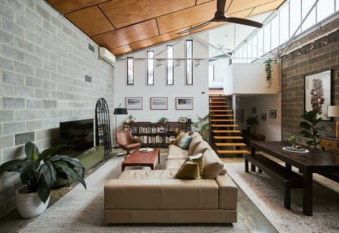 Take in the dramatic warehouse layout, where soaring ceilings, exposed concrete walls, timber-lined ceilings and open loft bedrooms create a distinctive setting.