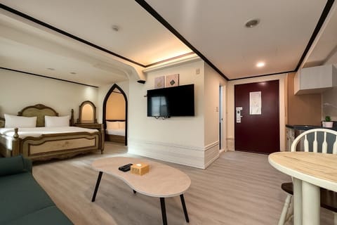 Comfort Quadruple Room | Premium bedding, down comforters, desk, soundproofing