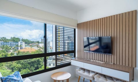 Basic Apartment | Living area | 40-inch TV with digital channels