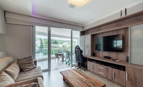 Basic Apartment | Living area | 40-inch TV with digital channels