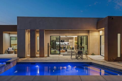 Custom pool, with a backyard that comes alive at night with perfect lighting