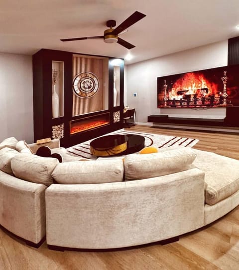 Boutique 3BR Oasis — 100” Theater TV • Modern Luxury Living Room