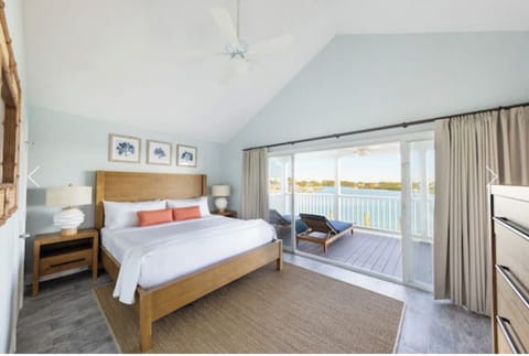 Wake up to soothing water views from your bed.