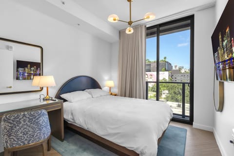 Condo, 2 Queen Beds, Balcony, City View (Wynwood Luxury Atelier) | 2 bedrooms, desk, laptop workspace, individually decorated