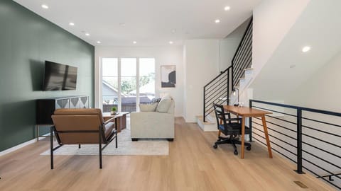 Apartment (3 Bedrooms) | Living area | 50-inch TV with digital channels
