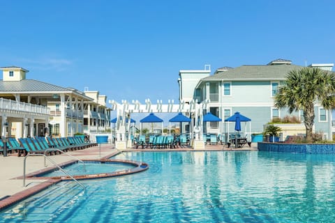 Rent a cabana or lounge in the sun at the Beach Club pool