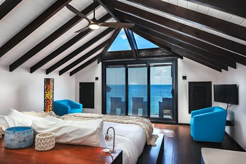 Stretch out in the loft suite with soaring beams and sea breeze.