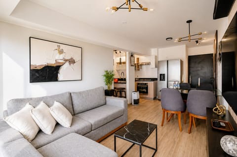 Apartment, City View | Living area | 50-inch Smart TV with digital channels, Netflix, streaming services