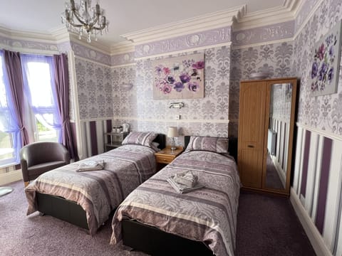 Twin Room, Ensuite (Promenade View) | Iron/ironing board, free WiFi, bed sheets