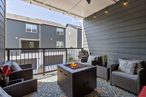 Covered Deck with String Lights, Fire-pit, and Charcoal Grill