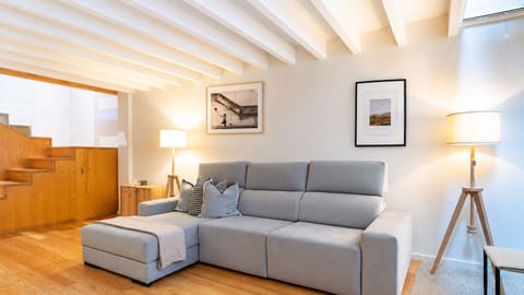 Relax in a cosy living room designed for quiet evenings after a day by the beach.
#HomeComfort #RelaxAndUnwind #SeasideLiving