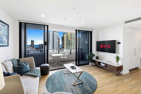 Spacious Open Plan Living Area
Relax in the bright open-plan living space with Smart TV, Netflix and balcony access.