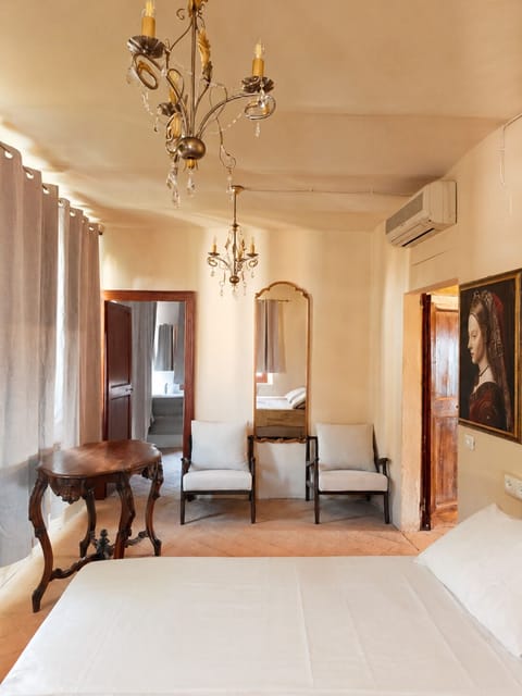 Luxury Suite, 2 Bedrooms, Private Bathroom, Garden View | Minibar (free items), in-room safe, desk, laptop workspace