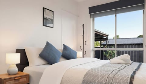 Clean and comfortable bedroom with fresh linens