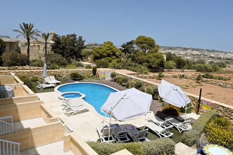 Standard Apartment, 3 Bedrooms, Balcony (Pool And Sea - Modern Apart Sannat) | Pool | Seasonal outdoor pool