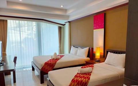 Family Room | Hypo-allergenic bedding, minibar, in-room safe, individually decorated