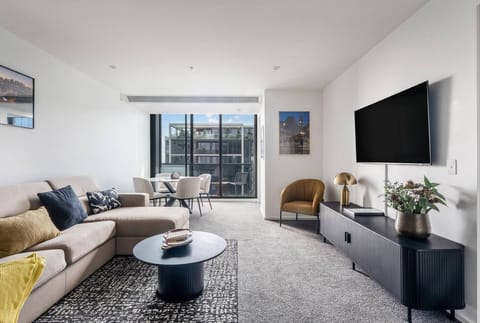 Relax and watch your favourite shows in the spacious living area, designed for comfort and flowing seamlessly to the balcony and views.
