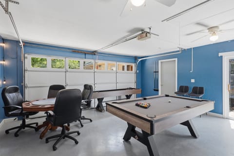 Private game room with pool, shuffleboard, and card table fun