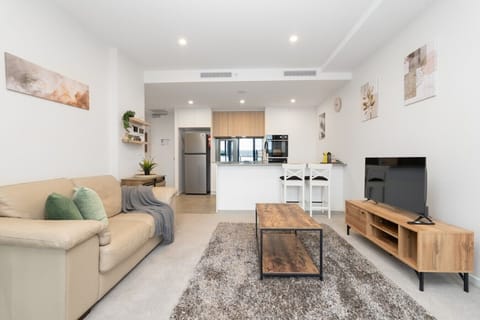 A beautifully connected living and kitchen space offering plenty of room to relax, cook and enjoy the comforts of home.