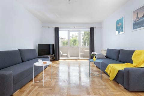 Relax in the stylish living room with a comfortable sofas and cosy decor.