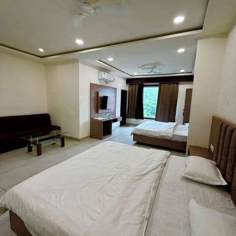 Family Quadruple Room, City View | Iron/ironing board, WiFi (free)