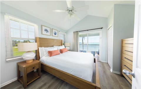 Wake up to serene bay views from plush king comfort.