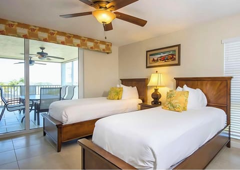 Rest easy in a bright bedroom with comfy double beds.