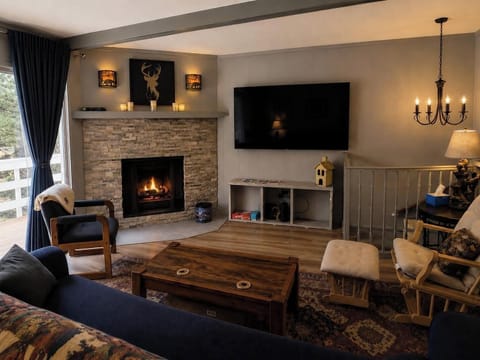 Cozy up by the crackling fireplace!