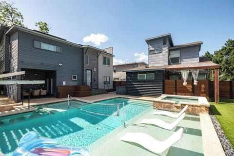 Private Pool with Hot Tub and Swim Up Bar

Heating options available for pool and hot tub

- Swim Up Bar
- Outdoor Seating area
- Lounge Chairs
- Two Cabanas
- In Water Lounge Chairs
- Floaties
- In Water Volleyball Net
- Nighttime Pool Lighting

