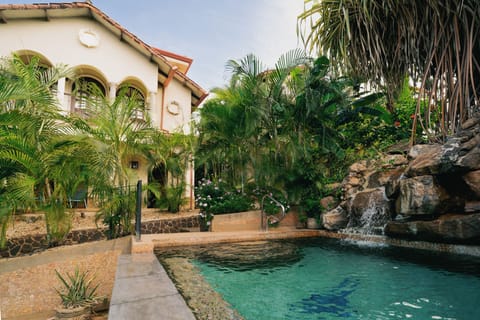 View of the villa from the top pool