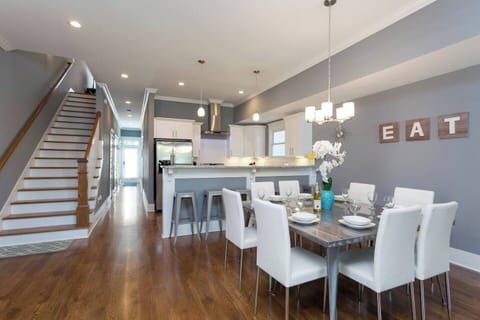 The kitchen and the stairs up to the other bedrooms.