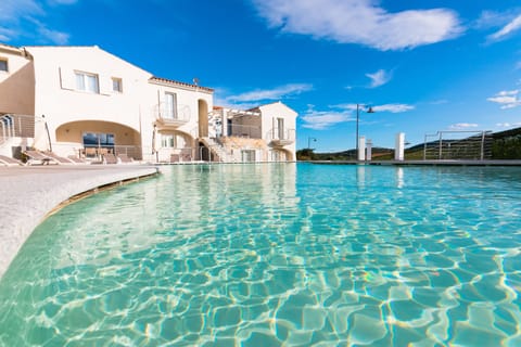 Seasonal outdoor pool, pool umbrellas, sun loungers