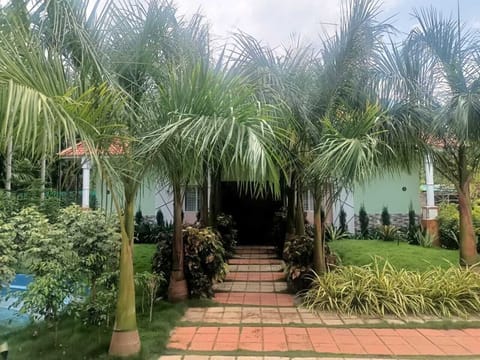 Deluxe Double Room, Balcony, Garden View | Property grounds