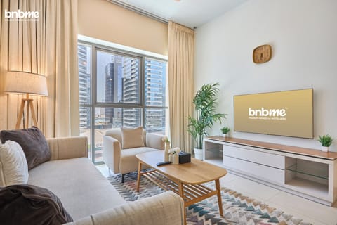 Superior Apartment, City View | Living area | 55-inch flat-screen TV with digital channels