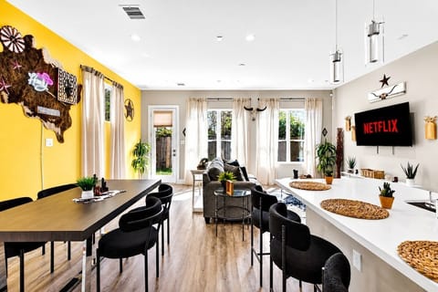 Living Room: Bright Texas charm with stylish seating, chic decor, and ample natural light!