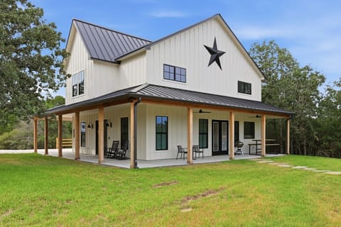 Welcome to the Quiet Pond Retreat, a peaceful getaway featuring four spacious bedrooms and three and a half bathrooms.