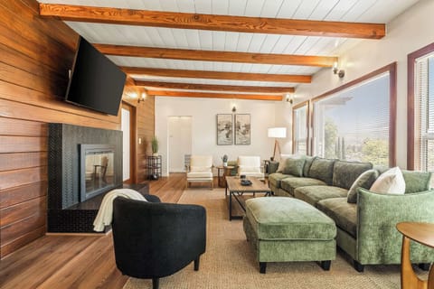 Living room with fireplace and smart TV