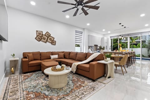 Bright, open living spaces create an easy setting for lounging, dining, and spending time together. (Palm Perch).