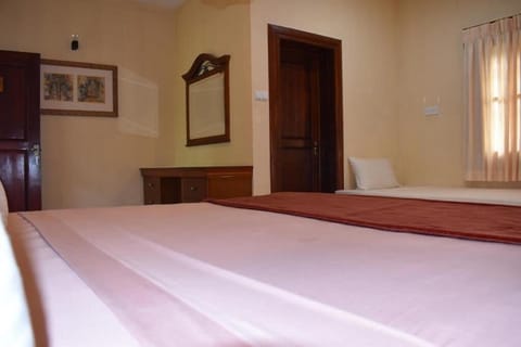 Triple Room, Patio, Poolside | In-room safe, WiFi (free)