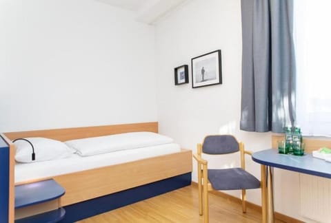 Desk, WiFi (free), bed sheets